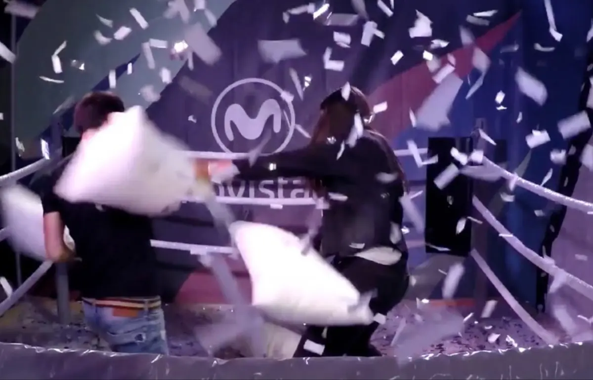 People throwing pillows amid falling confetti on the Movistar+ stage at Sónar