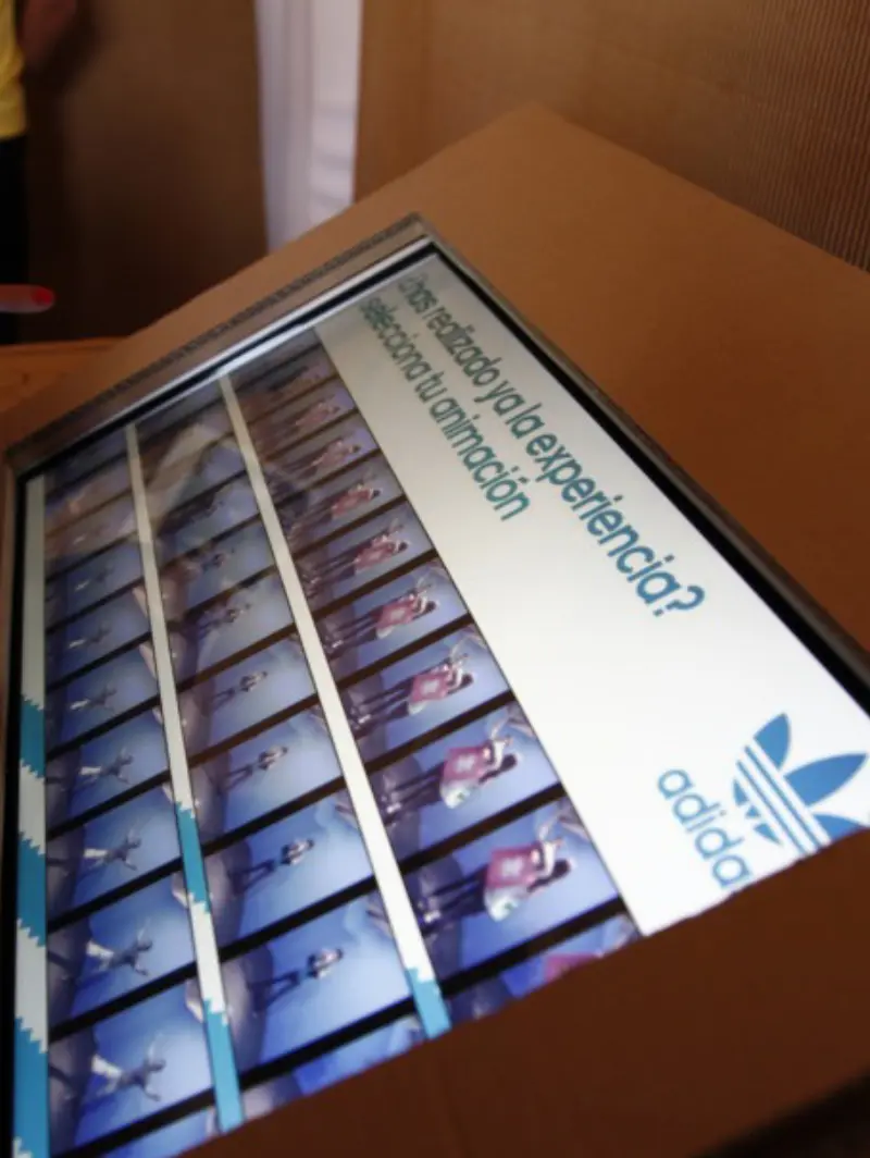 Touchscreen at the Adidas Ghettorama installation showing a grid of video thumbnails