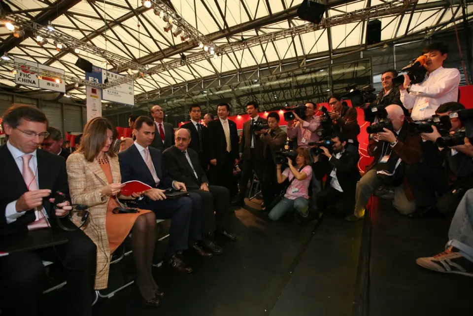 Photographers and guests watching the opening act of the showroom